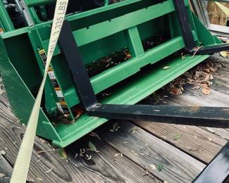 John Deere 1025-R Sub-Compact Utility Tractor with 60D Autoconnect Mid Mount Side Discharge Mower, Rear Mount Box Blade, Fixed Ting Pallet Loader and 120-R Front End Loader. 16 FT Bumper Pull Flatbed Trailer.