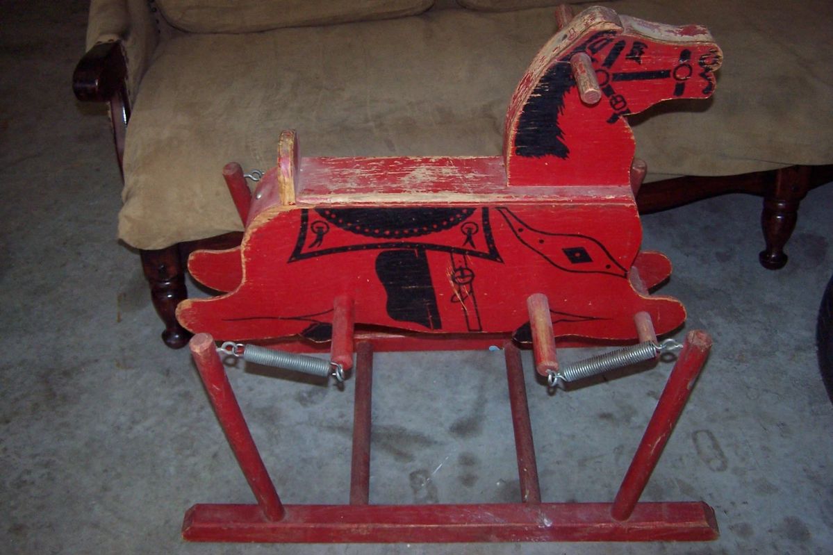 VINTAGE WOODEN ROCKING HORSE. 