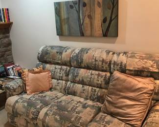 With recliners! Wall decor!