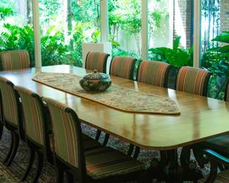 Baker Dining Room Table with 3 leaves ( 138" long x 48" wide by 29" tall) and 12 chairs (2 with arms).  The rug under the table is 174" long with the fringe by 115" wide.