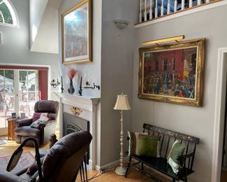 living room furniture and art for size perspective.