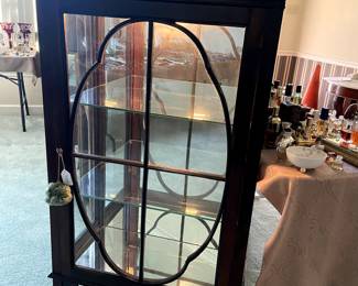 This is a beautiful mirrored cabinet with light.