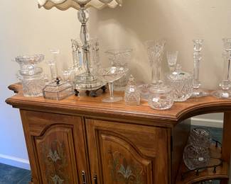 This oak sideboard has side shelves and great storage. We have lots of crystal and glass pieces. 