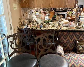 We have a set of 4 metal bar stools that swivel.