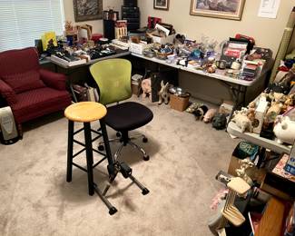 The office is loaded with supplies, music, radios, books, etc.