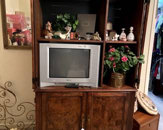 Huge Burl wood armoire.  This also has a pull out drawer for computer keyboard and file drawer.