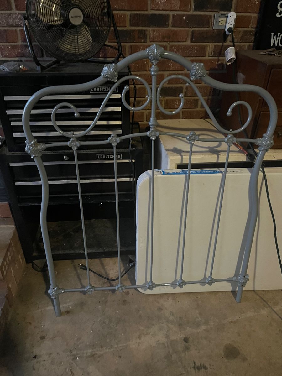 Single metal headboard.  Vintage professionally painted. 