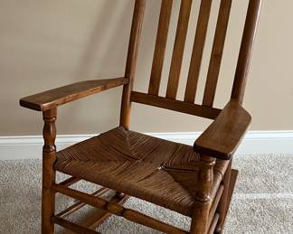 Rocking chair with woven seat