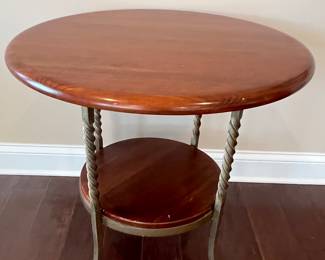 Round side table with metal legs and shelf