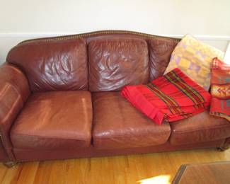 Studded leather sofa