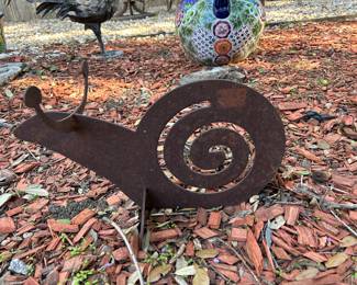 Metal snail yard art