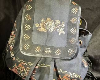 Free People black fringed backpack 