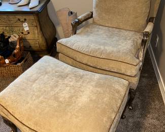 Beautifully upholstered chair with ottoman 