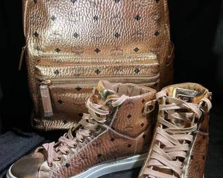 MCM champagne gold backpack and high top sneakers 
