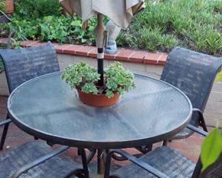 Outdoor dining patio set , umbrella included

  $75  for  all