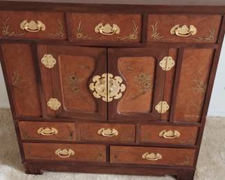 Antique China Cabinet with laminated design.                      $125