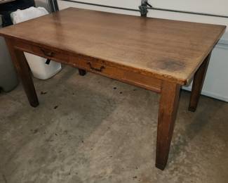 Antique desk. Would also be a cool coffee table if you cut down the legs