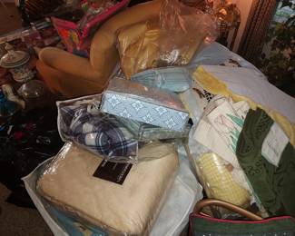 Tons of brand new linens 