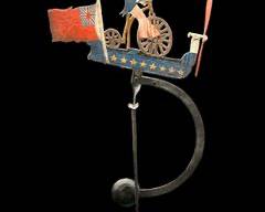 Vintage Folk Art Uncle Sam Riding a Bicycle US FLAG Cast Iron Pendulum