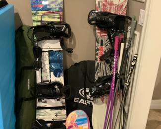 2 SNOW BOARDS WITH BOOTS AND POLES