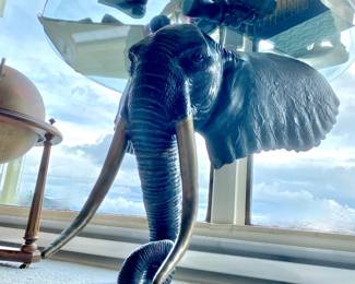 Glass Top Table with Elephant Head Base