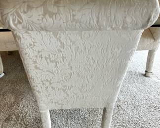 Glass Top Dining Table with Stone Base, Set of 6 White Upholstered Rolling Dining Chairs