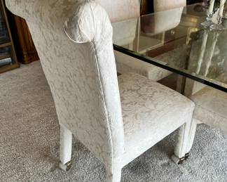 Glass Top Dining Table with Stone Base, Set of 6 White Upholstered Rolling Dining Chairs