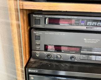 Technics Stereo Cabinet, Technics DC ServoTurntable - SL-BD27, Technics Quartz Synthesizer/Stereo Tuner - ST-S98A, Technics Stereo Amplifier SU-V98 AM/FM Tuner - ST-S98, Sony Compact Disk Player - CDP-C500, Technics Double Cassette Deck - RS-TR157