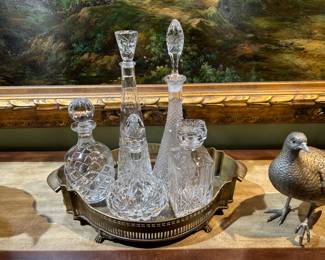 Brass galley tray and lead crystal decanters.