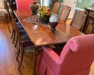 Another shot of table with two Wood Armfield upholstered arm chairs.