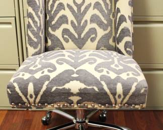 Grey/Cream upholstered office chair with brads. $75.00.