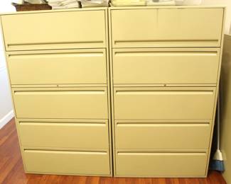 Two five drawer file cabinets. 36" W x 18" D x 63" H.     $75.00 each.