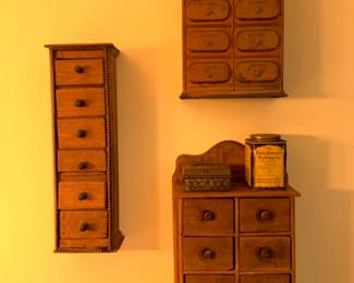 Antique spice boxes.   So lovely for any place in house