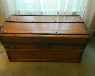 Antique wooden with metal travel trunk