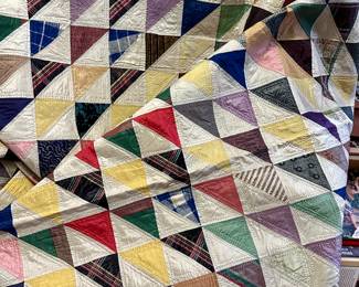 Handmade 'Many Geese" silk quilt assembled from Milliner's scraps.