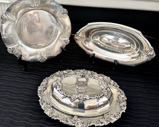 Vintage silverplate serving pieces, including covered vegetable dishes