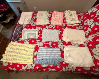 Vintage child’s quilts and blankets