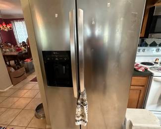 LG, stainless steel side-by-side refrigerator