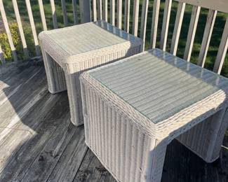 Pair of rattan tables with glass tops asking $100 for the pair