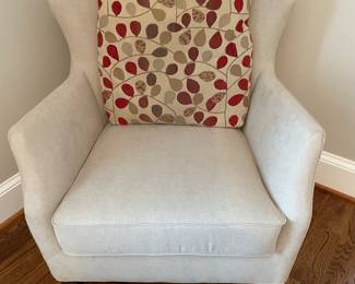 TWO NEW matching Pottery Barn side chairs asking $800 for the pair. The color is beige.