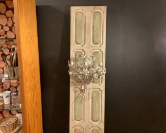 Door panel with tole light fixture