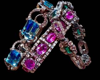Aquamarine and diamond bracelet, 1950’s platinum, diamond and pink sapphire bracelet from Neiman Marcus; 1950’s platinum, emerald and diamond bracelet from Neiman Marcus