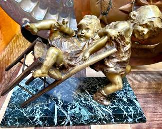 Brass sculpture on marble