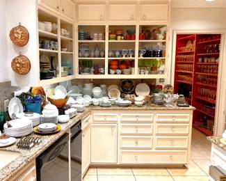 The kitchen is overflowing!  More than 40 sets of dishes and 40+ sets of crystal.  