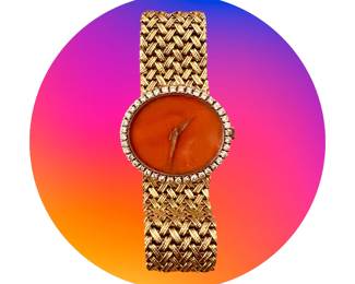 Vintage Piaget 18k yellow gold, diamond and coral ladies watch.  This is Janelle’s favorite of all the watches.  It’s just glamorous!