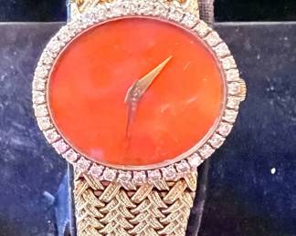 Vintage 18k, coral and diamond ladies Piaget cocktail watch.  This watch is gorgeous and the coral is brilliant orange!