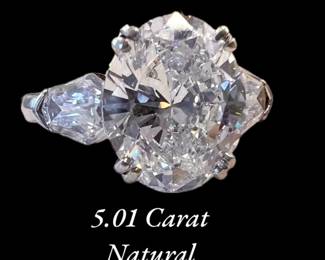 5.01 carat diamond center stone - Color F - SI1; (2) shield cut natural side diamonds 1.40 ctw - Color F-G - VS2-SI1