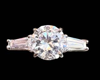 1.93 carat center stone diamond ring in a custom 14k white gold mounting….new custom handmade mounting…vintage center stone and baguettes.  Perfect for an amazing engagement ring that lasts a lifetime!