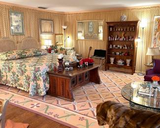 Gues bedroom with hand painted king bed