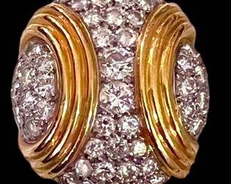 1980’s very large diamond dome ring.  I actually LOVE this ring.  Great weight and very nice stones.